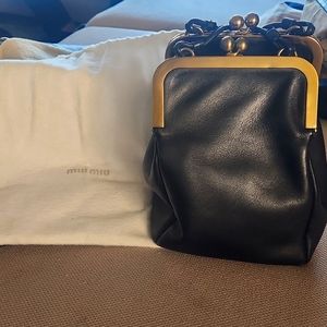 Miu Miu Black Leather Bag with Gold Accents